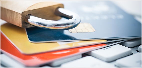 Credit and debit cards and a padlock