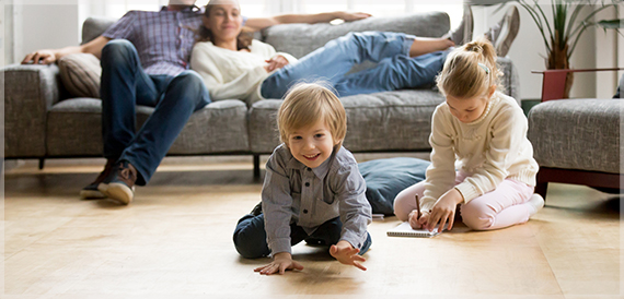 Family relaxing and playing in a living room